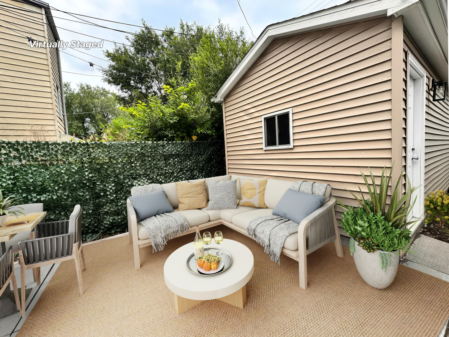 4409 South Prairie Avenue Chicago, IL 60653 - Photo 41 of 44 a view of a chair and tables back yard of the house