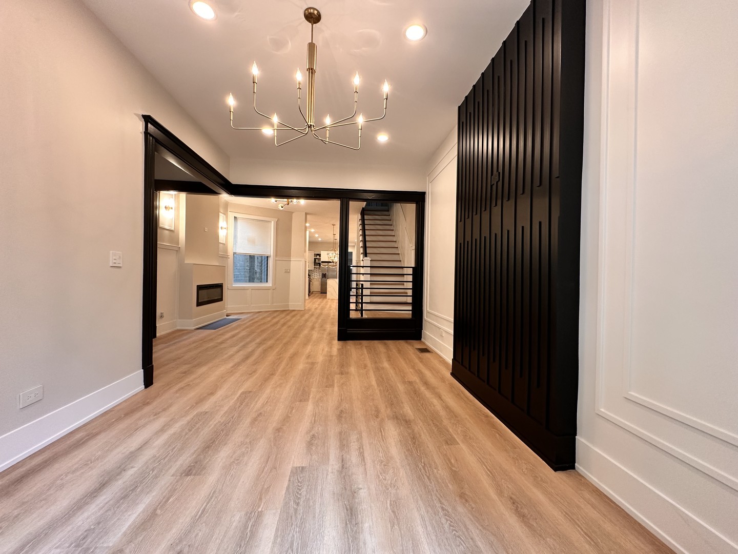 4409 South Prairie Avenue Chicago, IL 60653 - Photo 6 of 44 wooden floor in an empty room with a window
