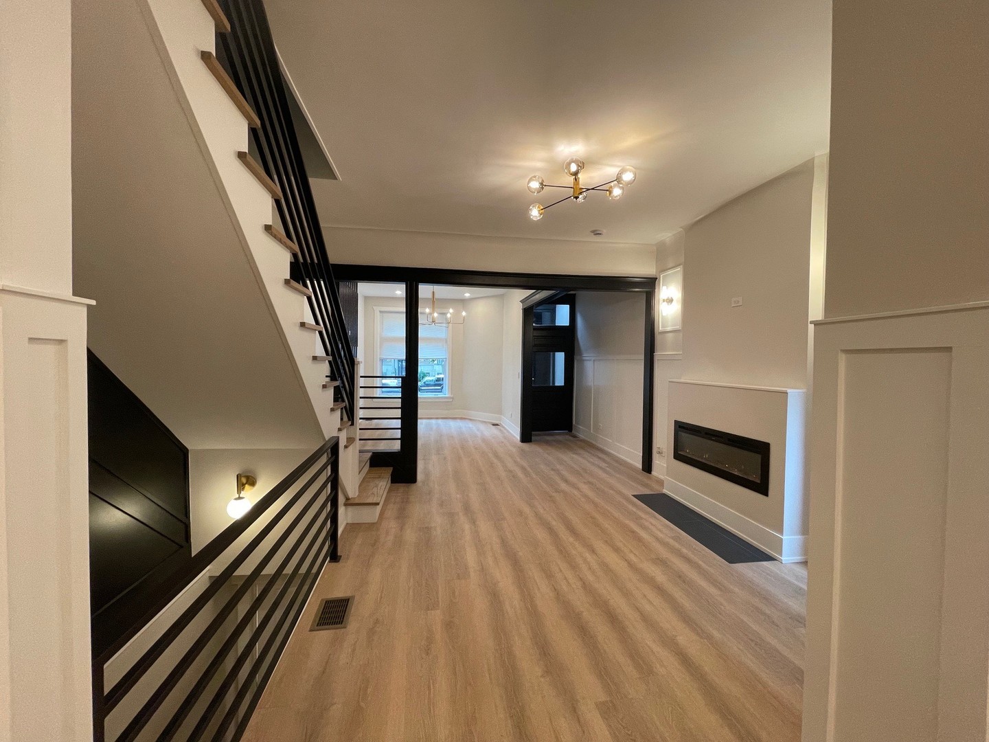 4409 South Prairie Avenue Chicago, IL 60653 - Photo 9 of 44 a view of entryway and hall with wooden floor