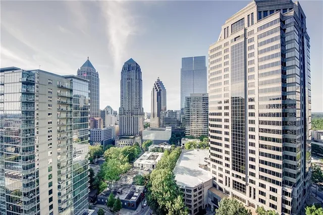 a view of a city with tall buildings
