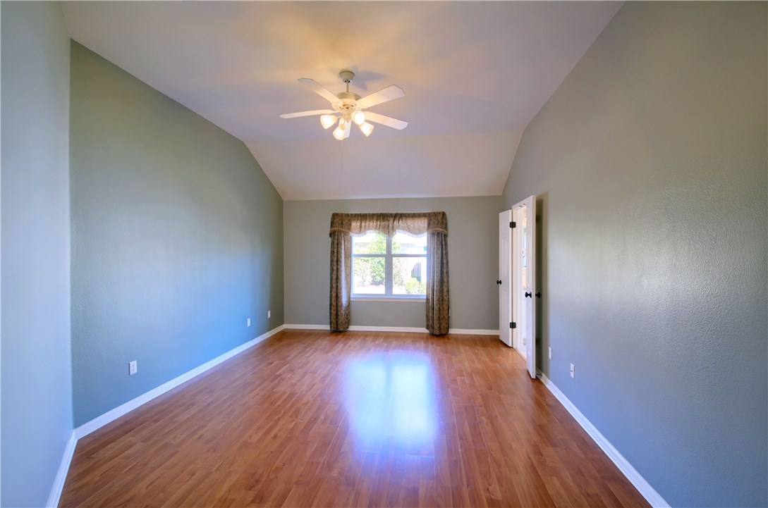 129 Copperwood Loop Round Rock, TX 78665 - Photo 21 of 30 a view of wooden floor and a chandelier in a room