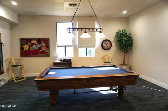 a view of a house with a swimming pool