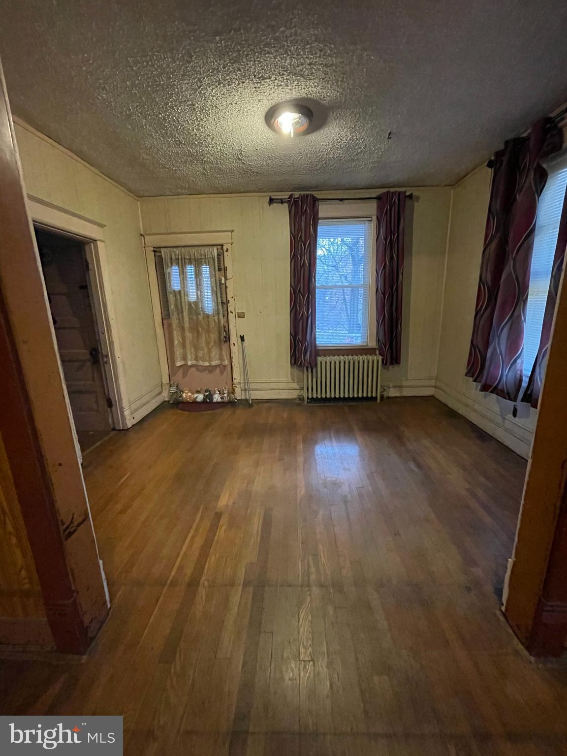 4161 Alabama Avenue Southeast Washington, DC 20019 - Photo 28 of 58 Living Room & Backdoor