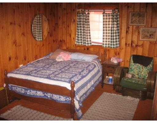 39 Beaver Road Ware, MA 01082 - Photo 13 of 15 a bedroom with a bed and a window