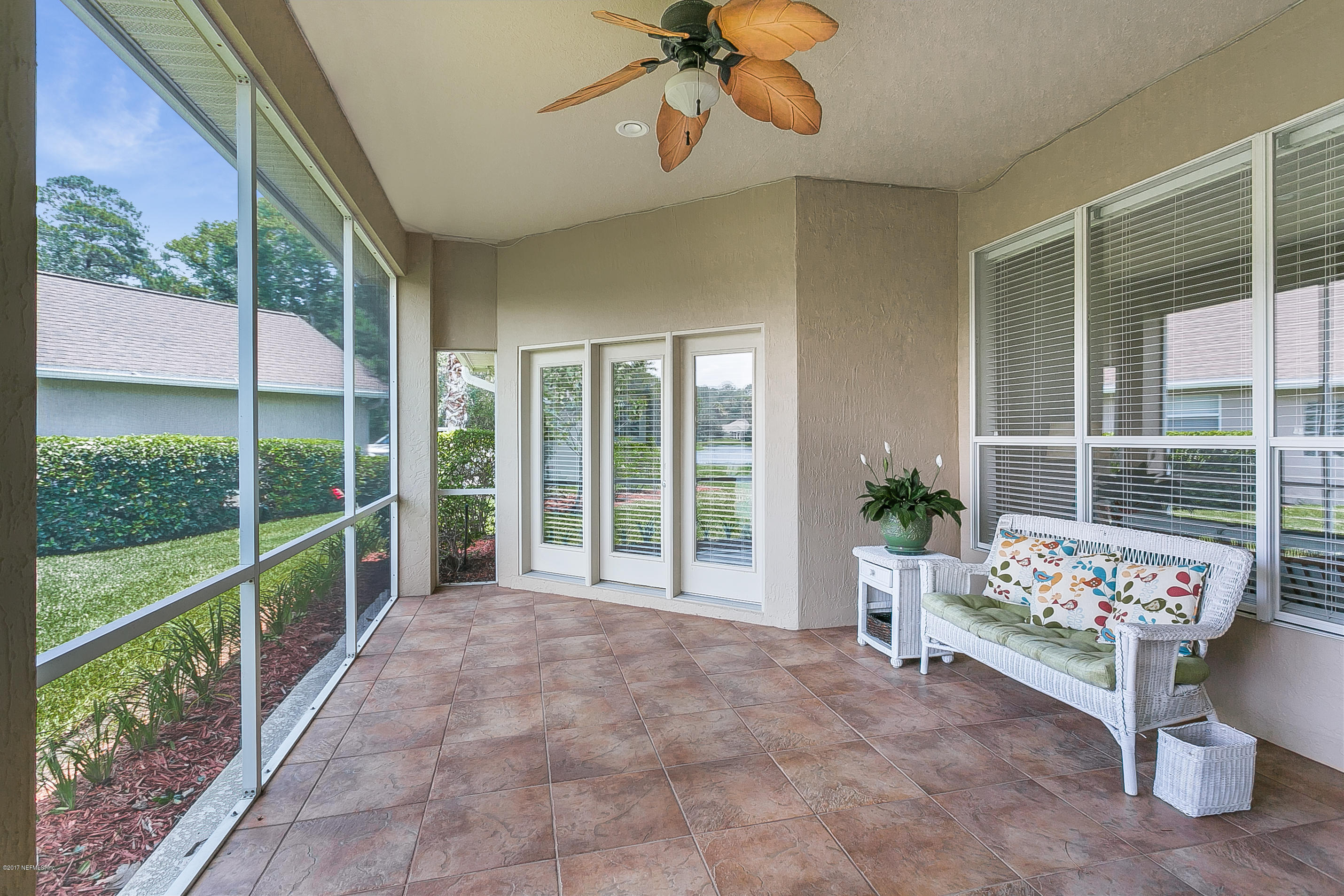 261 North Mill View Way Ponte Vedra Beach, FL 32082 - Photo 3 of 27 a living room filled with furniture and a large window