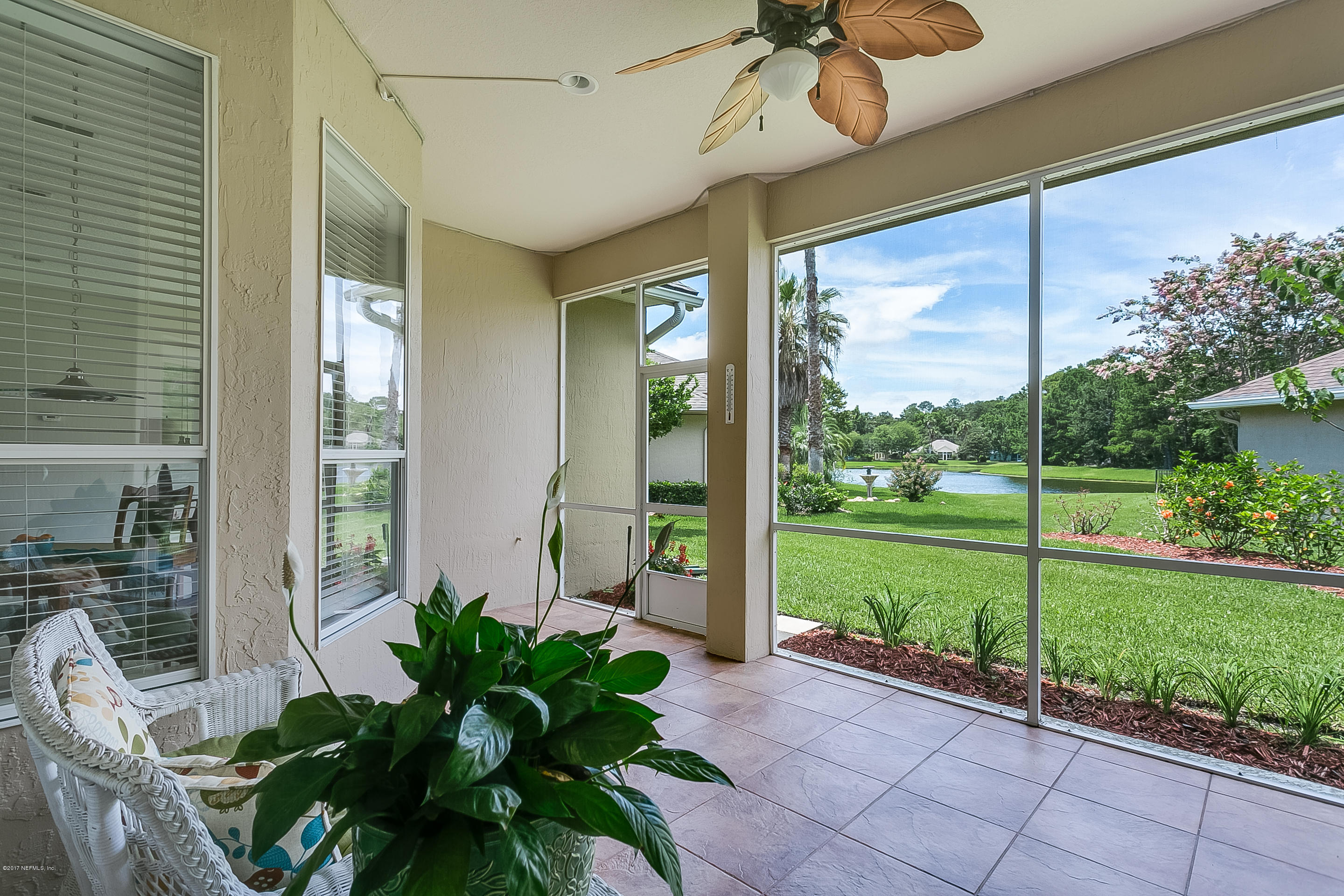 261 North Mill View Way Ponte Vedra Beach, FL 32082 - Photo 4 of 27 a view of a porch with furniture and garden