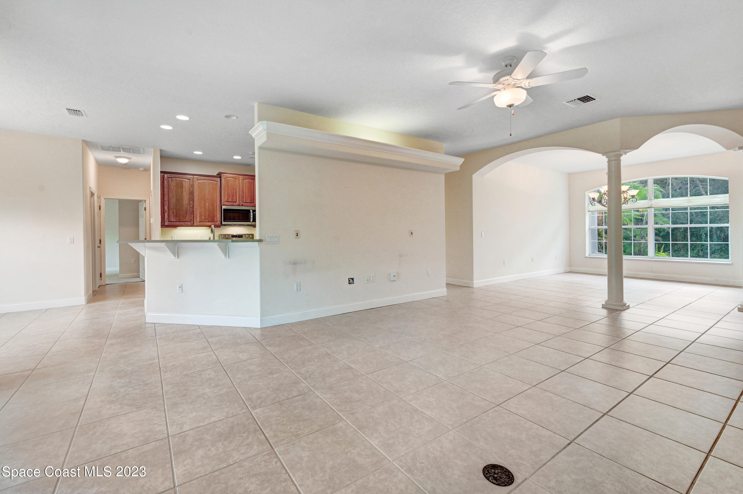 1074 Gray Road Cocoa, FL 32926 - Photo 15 of 47 a view of a kitchen with furniture and a kitchen