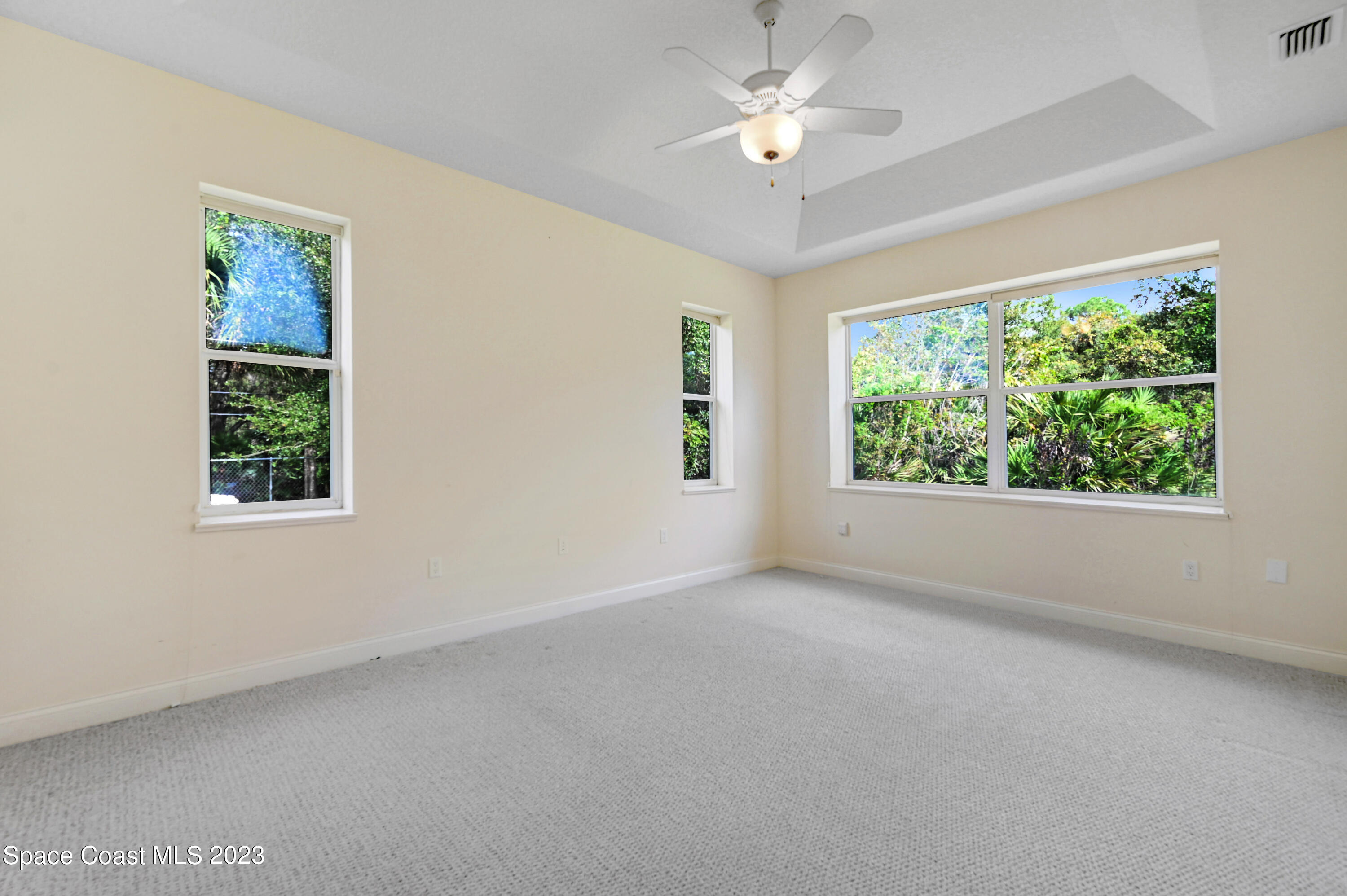 1074 Gray Road Cocoa, FL 32926 - Photo 25 of 47 wooden floor in an empty room with a window