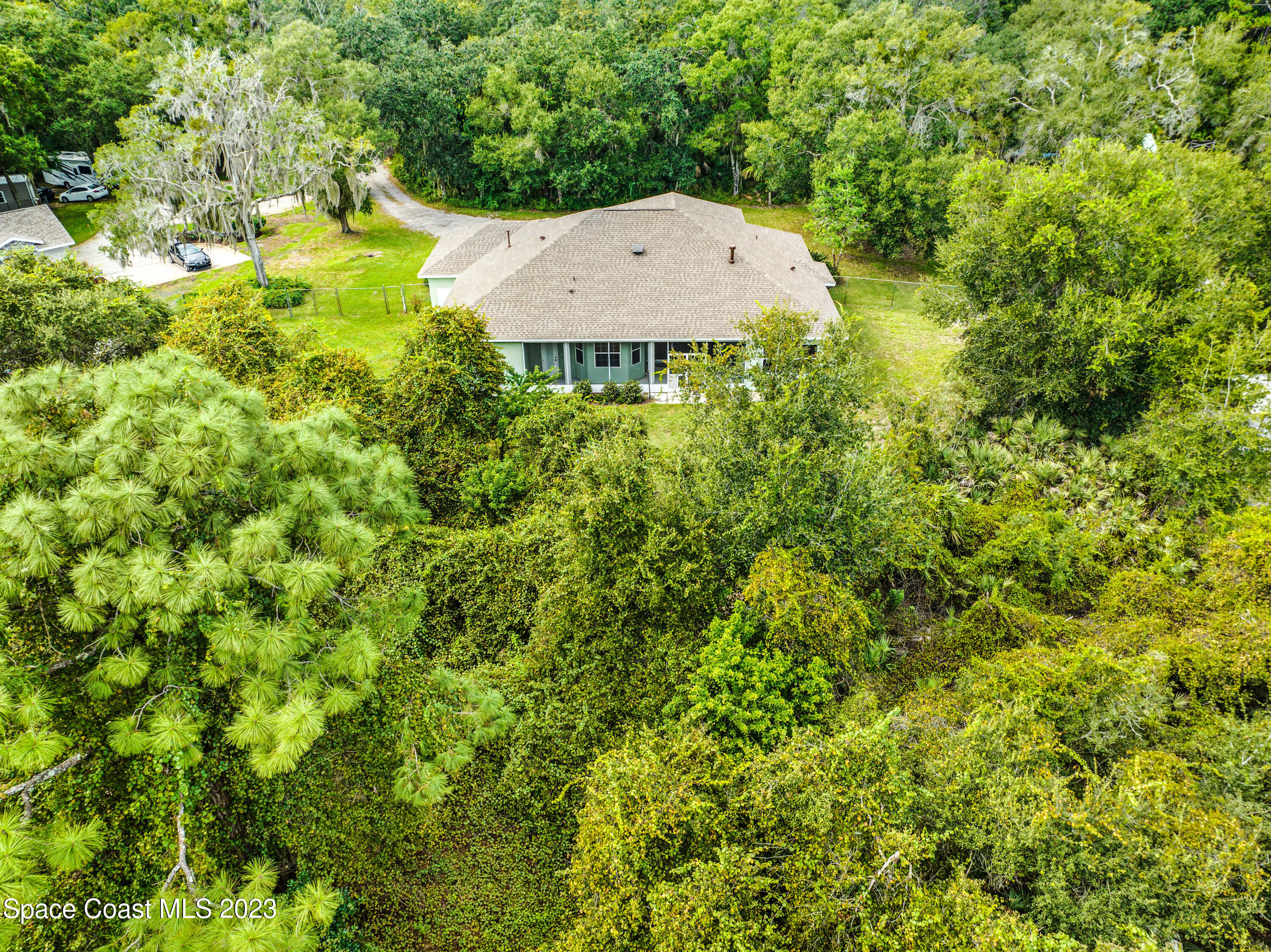 1074 Gray Road Cocoa, FL 32926 - Photo 34 of 47 a view of a yard in a garden