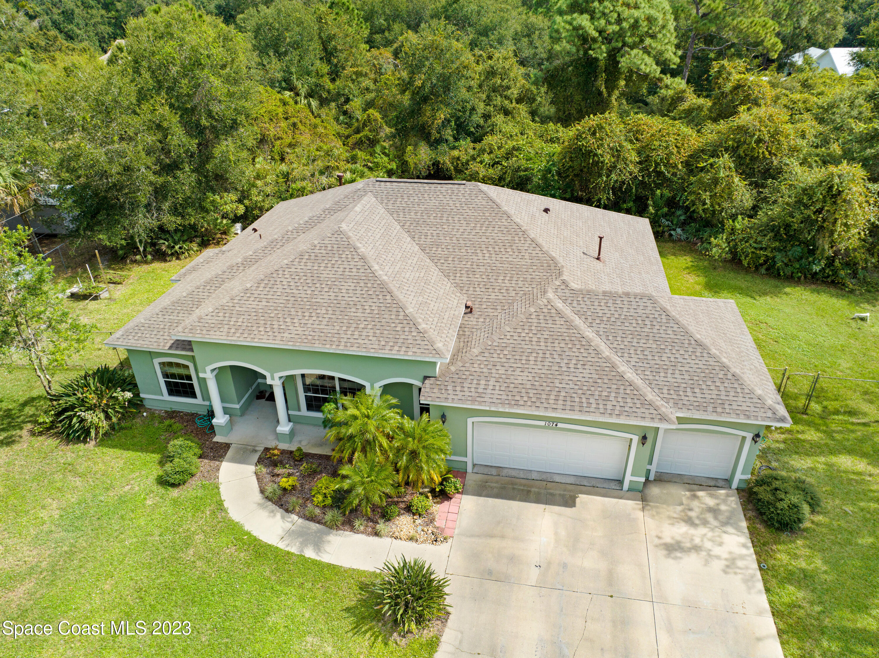 1074 Gray Road Cocoa, FL 32926 - Photo 38 of 47 an aerial view of a house