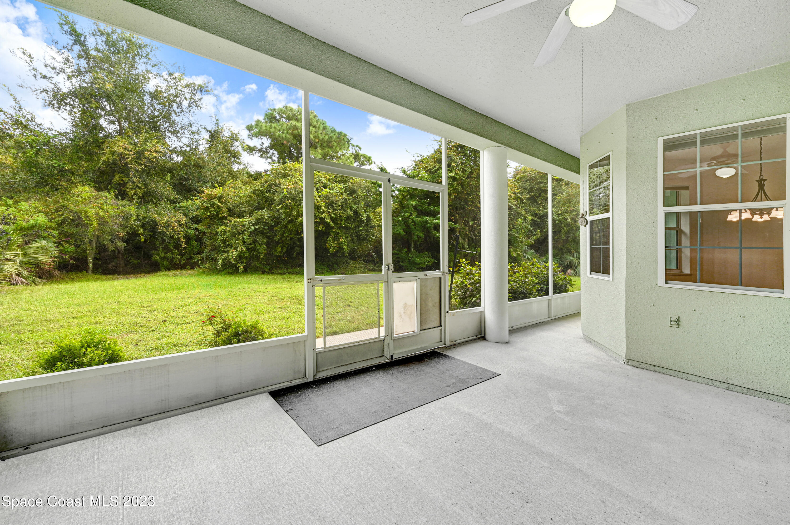 1074 Gray Road Cocoa, FL 32926 - Photo 5 of 47 a view of a garden from a window
