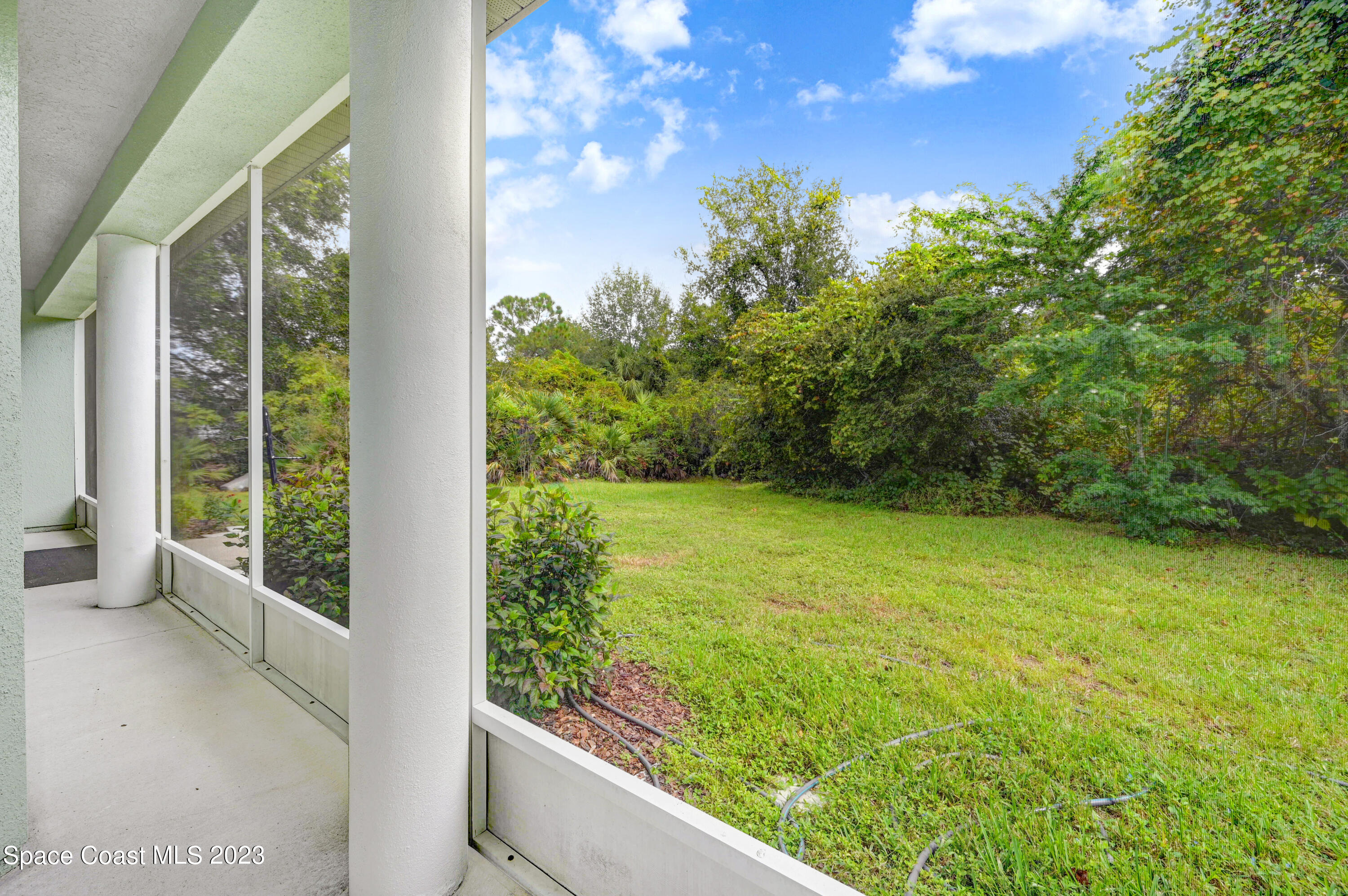 1074 Gray Road Cocoa, FL 32926 - Photo 7 of 47 a view of a yard from a balcony