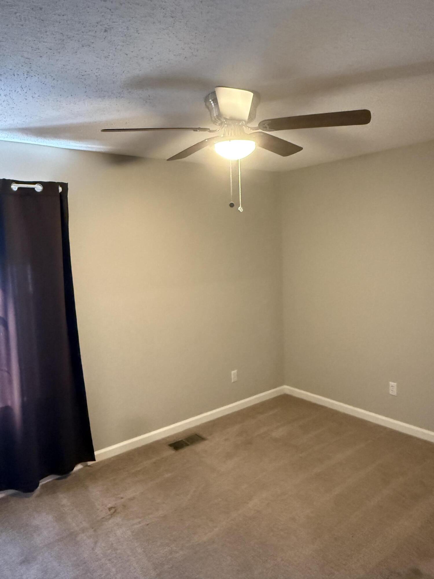 226 Pelham Road, Unit 6 Fort Walton Beach, FL 32547 - Photo 7 of 11 a view of an empty room