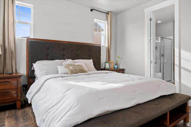 3359 Eurasian Crane Road Clinton, UT 84015 - Photo 20 of 71 Bedroom with dark wood-style floors and ensuite bathroom