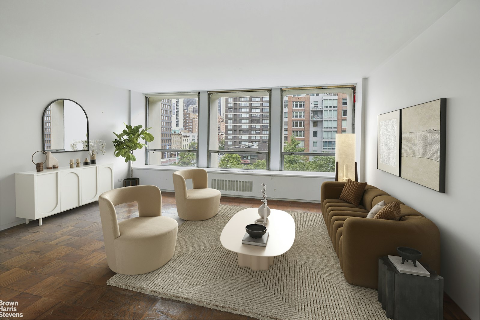 300 East 33rd Street, Unit 2KL Manhattan, NY 10016 - Photo 3 of 11 a living room with furniture and a large window
