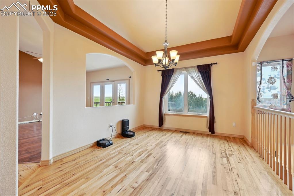 1625 North Yoder Road Yoder, CO 80864 - Photo 14 of 50 a view of livingroom with window and hardwood floor