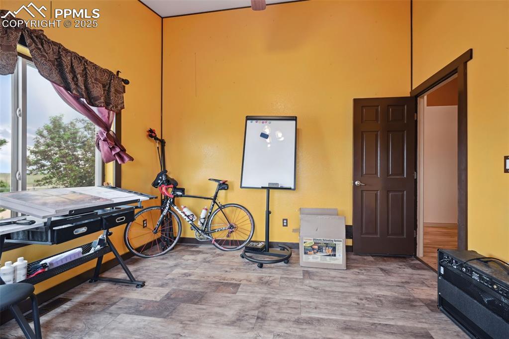 1625 North Yoder Road Yoder, CO 80864 - Photo 22 of 50 a backyard of a house with sofas table and chairs