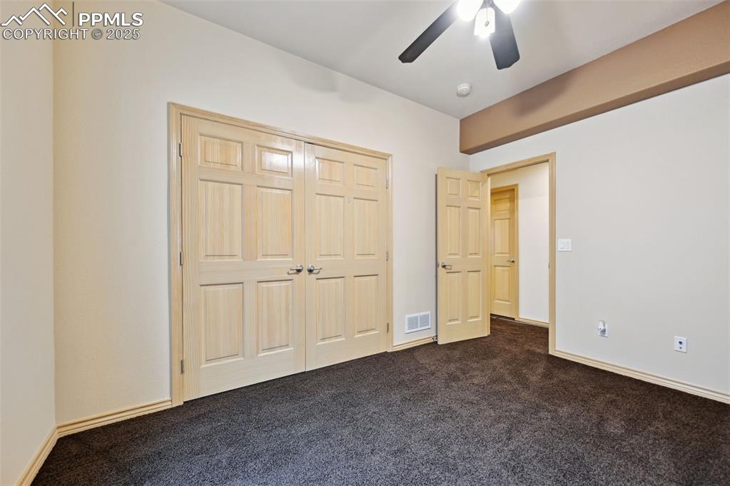 1625 North Yoder Road Yoder, CO 80864 - Photo 31 of 50 an empty room with closet area