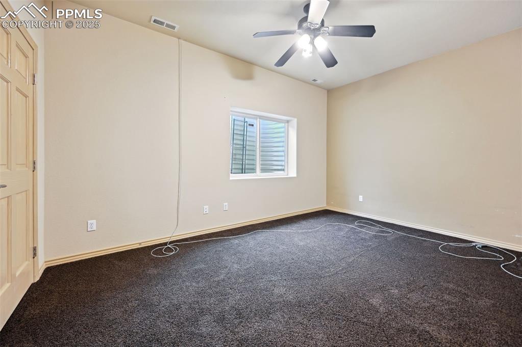 1625 North Yoder Road Yoder, CO 80864 - Photo 34 of 50 a view of an empty room with a window