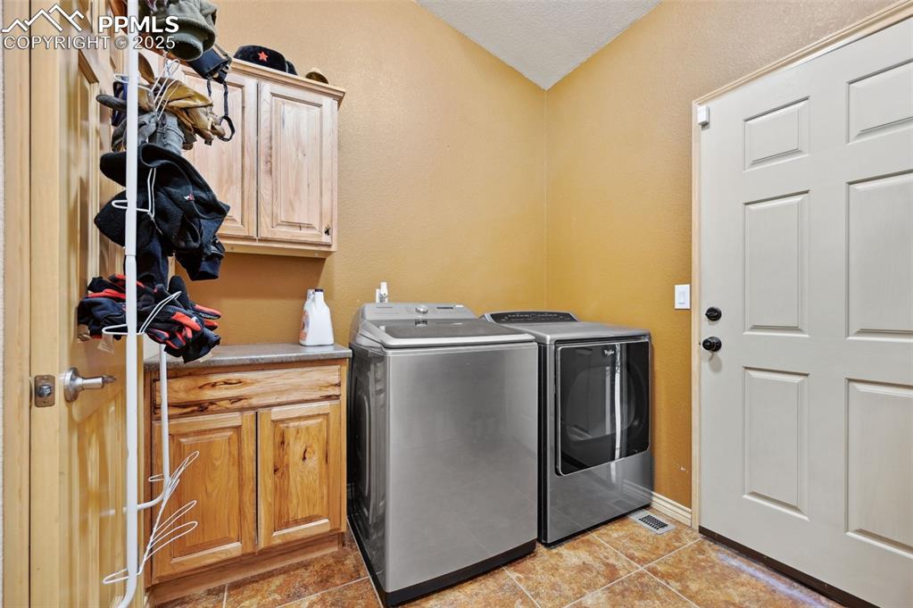 1625 North Yoder Road Yoder, CO 80864 - Photo 35 of 50 a utility room with dryer and washer