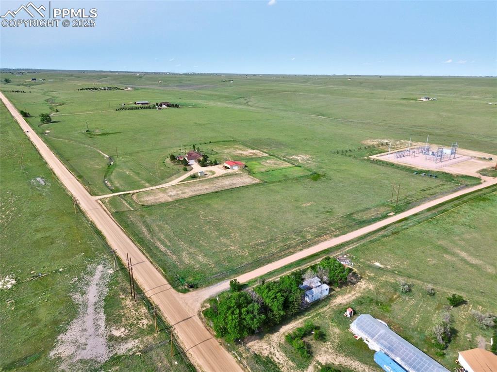 1625 North Yoder Road Yoder, CO 80864 - Photo 45 of 50 a view of a lake from a balcony
