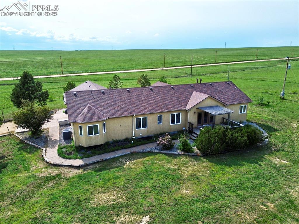 1625 North Yoder Road Yoder, CO 80864 - Photo 48 of 50 an aerial view of a house with a garden