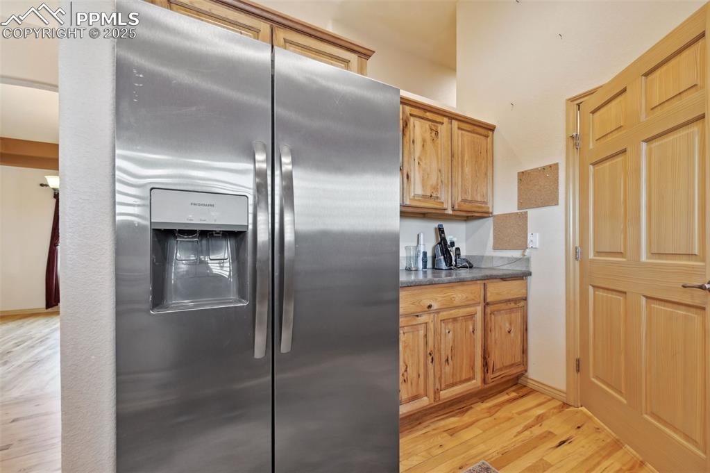 1625 North Yoder Road Yoder, CO 80864 - Photo 7 of 50 a bathroom with a granite countertop sink mirror and shower