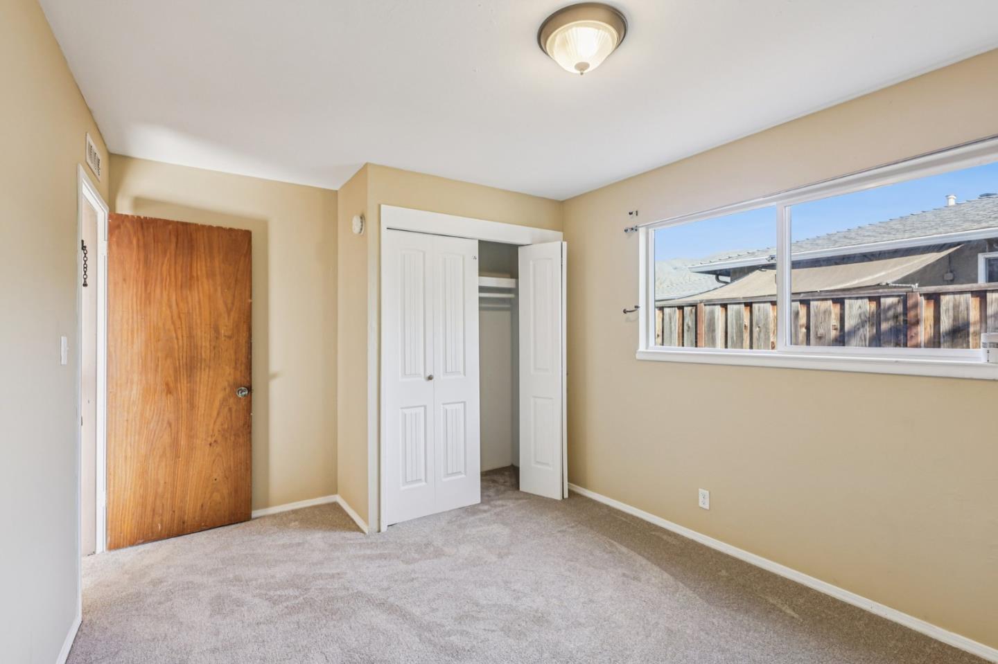 320 Coelho Street Milpitas, CA 95035 - Photo 15 of 34 an empty room with windows