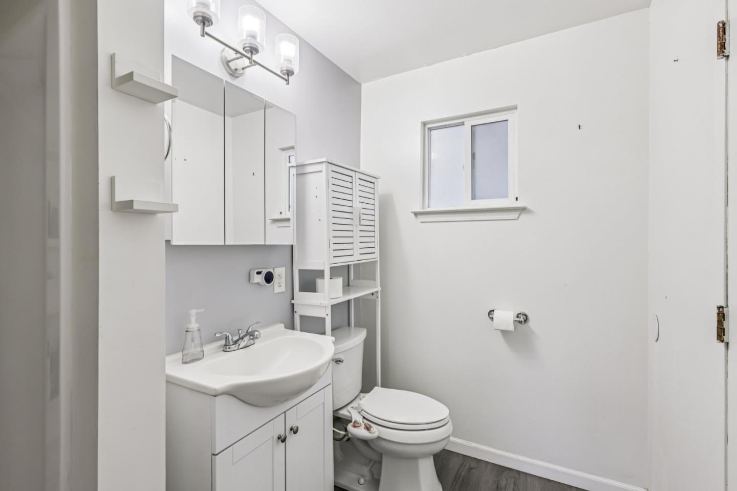 320 Coelho Street Milpitas, CA 95035 - Photo 20 of 34 a bathroom with a sink a toilet and mirror