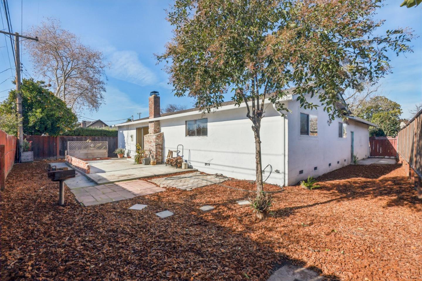 320 Coelho Street Milpitas, CA 95035 - Photo 21 of 34 a view of a house with a yard covered in snow