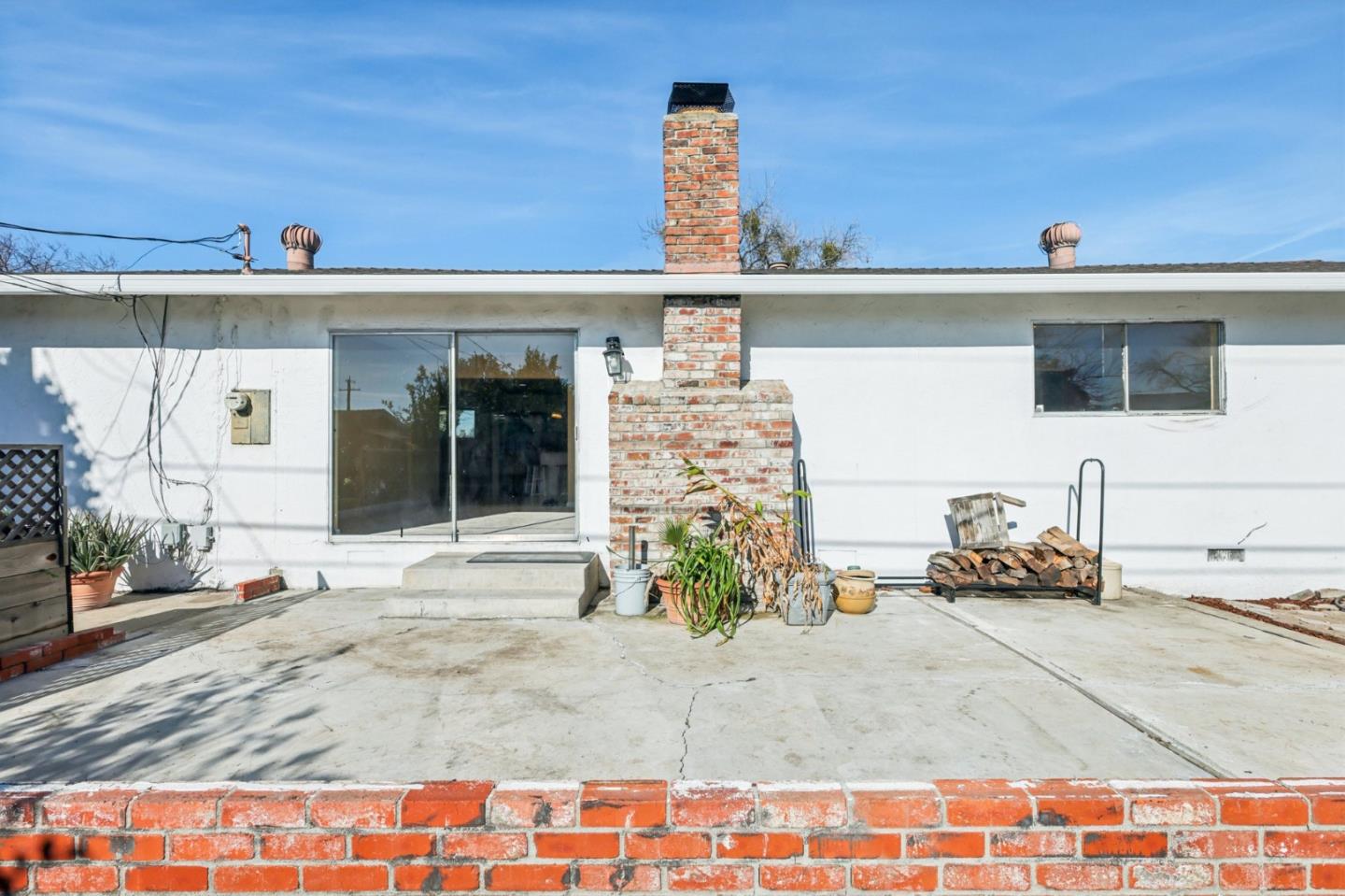 320 Coelho Street Milpitas, CA 95035 - Photo 22 of 34 a front view of a house with a outdoor seating space