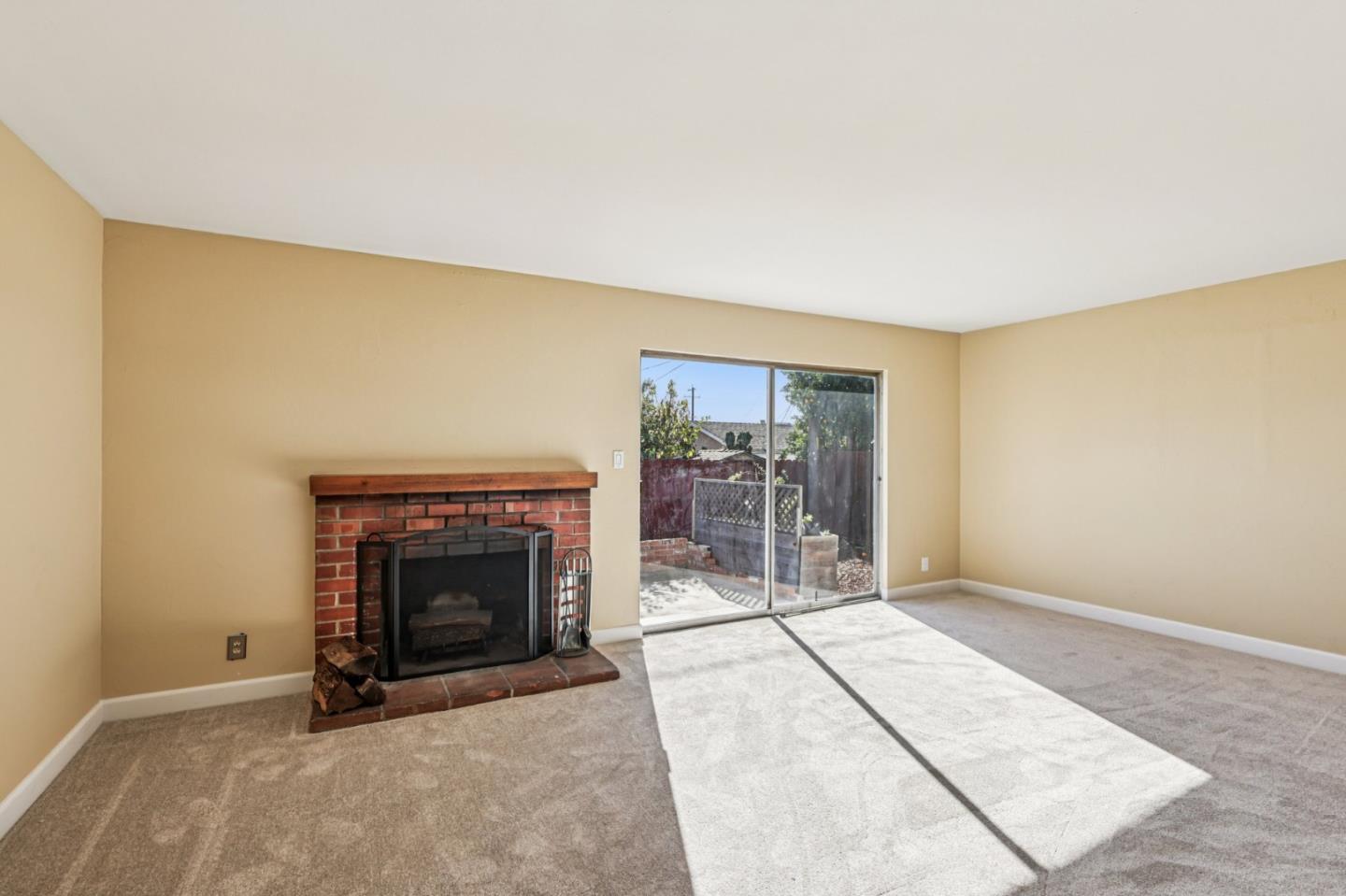 320 Coelho Street Milpitas, CA 95035 - Photo 4 of 34 an empty room with fireplace