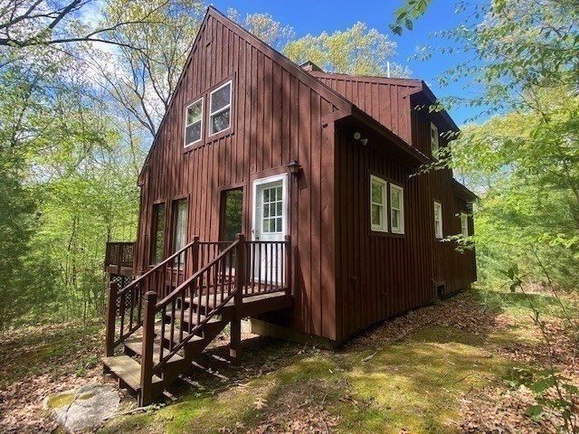 317 Fowler Road Northbridge, MA 01534 - Photo 33 of 40 a view of a house with a yard and wooden fence
