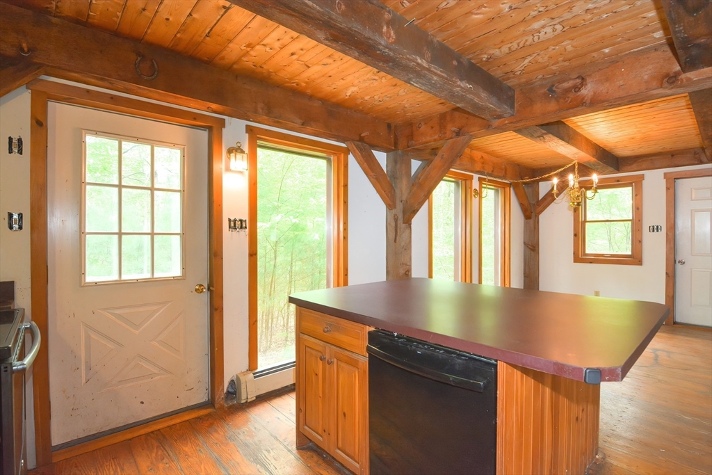 317 Fowler Road Northbridge, MA 01534 - Photo 8 of 40 a view of kitchen with furniture and large window
