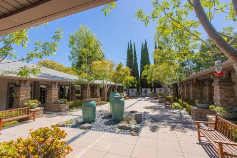 a view of an outdoor space and tennis court