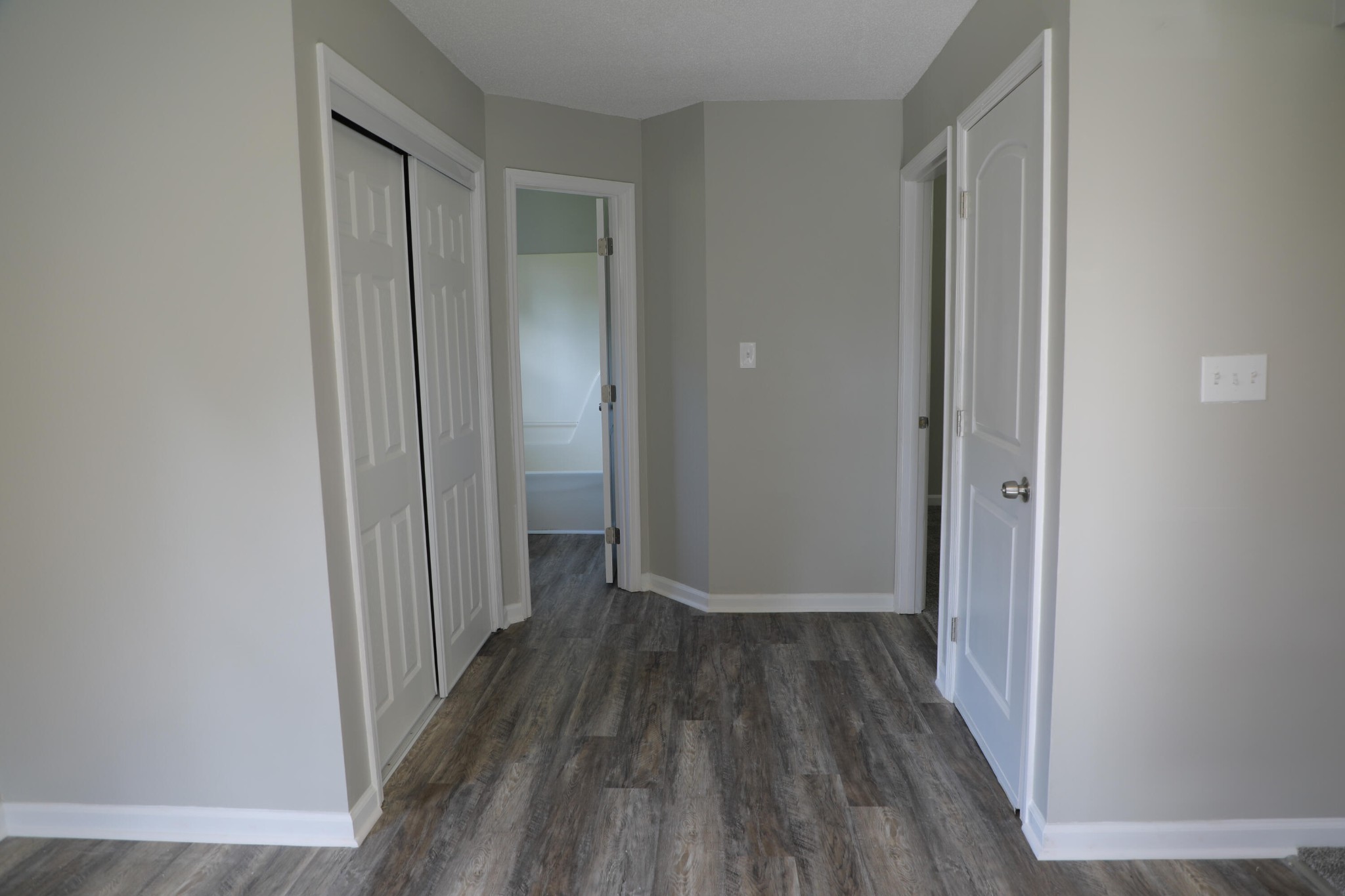 440 Samples Chapel Road Southeast Cleveland, TN 37323 - Photo 30 of 31 a view of a hallway with wooden floor