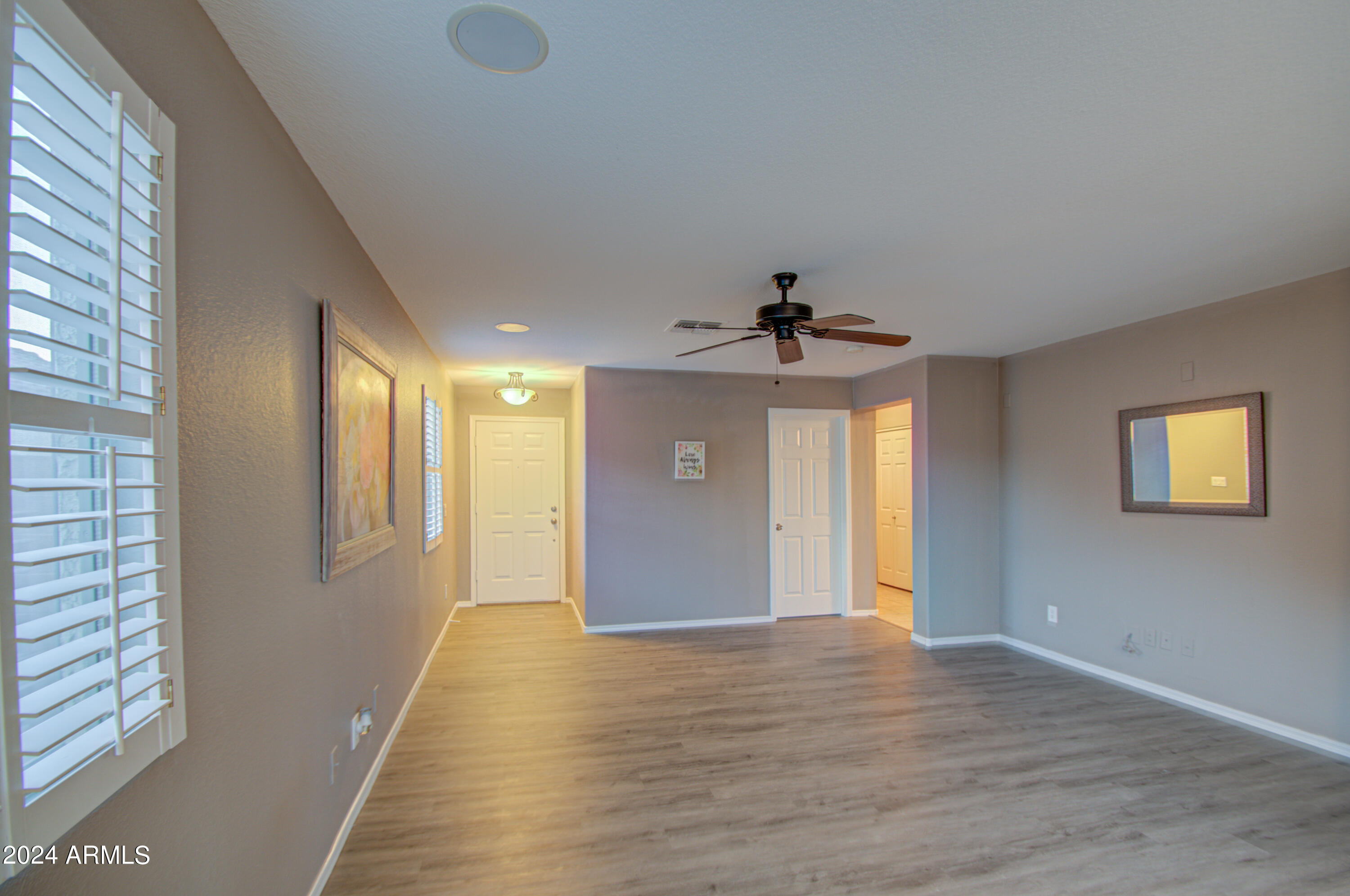 17473 West Calavar Road Surprise, AZ 85388 - Photo 6 of 35 Living Room 2