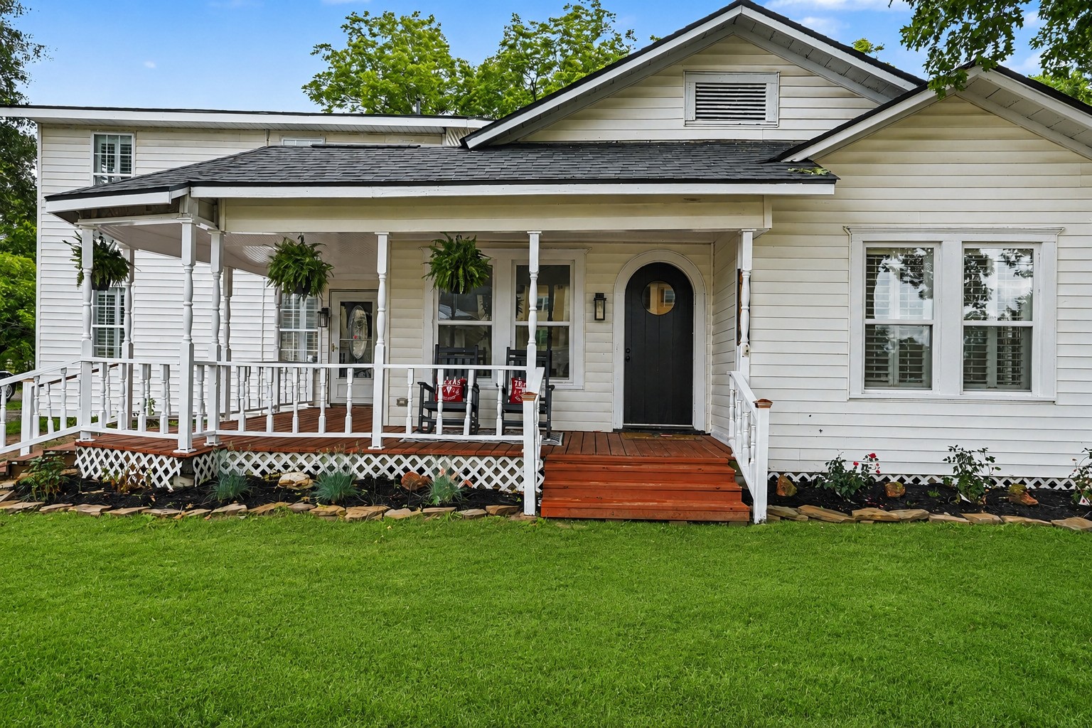31730 Waller Tomball Road Waller, TX 77484 - Photo 4 of 50 Charming white house with a cozy wraparound porch.