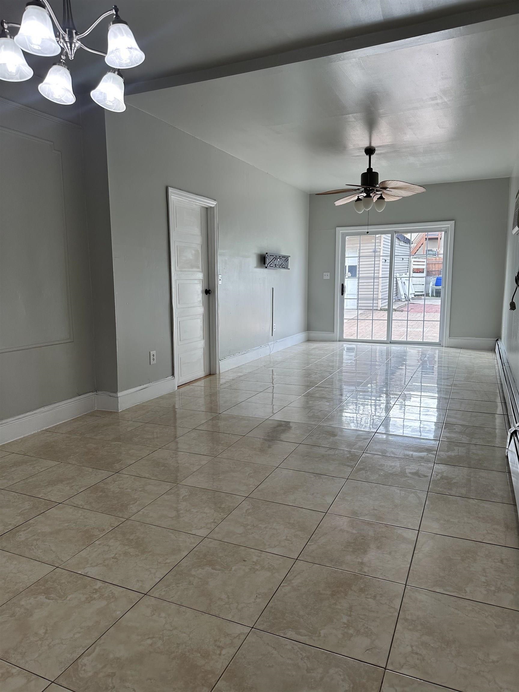 172 West 25th Street, Unit 2 Bayonne, NJ 07002 - Photo 4 of 11 a view of an empty room with a window