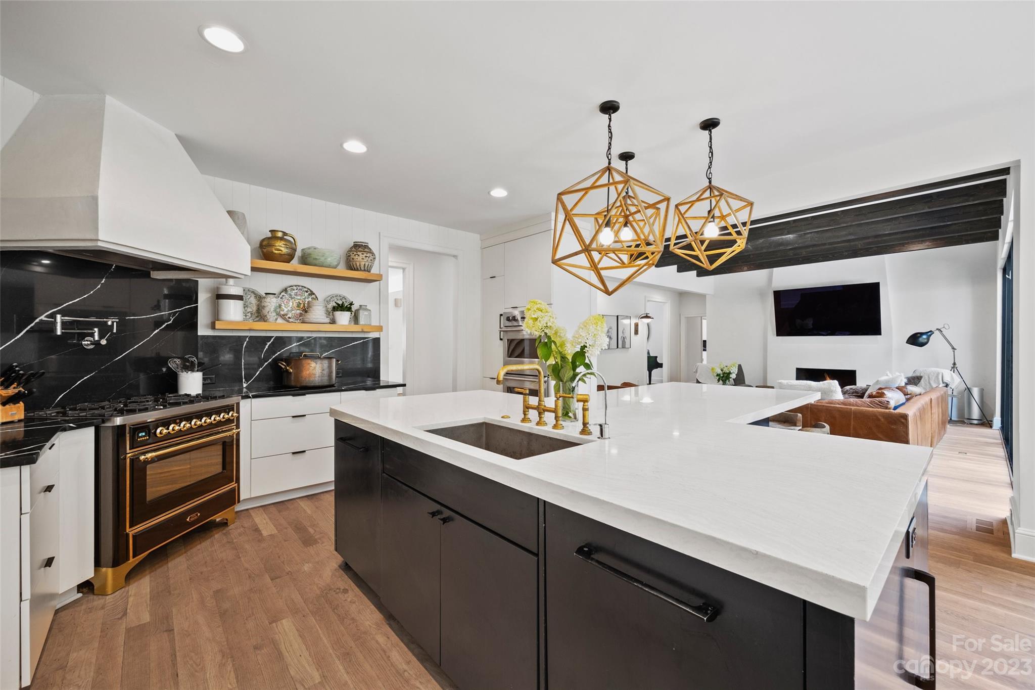 18930 Mary Ardrey Circle Cornelius, NC 28031 - Photo 12 of 48 a kitchen with a sink appliances and cabinets