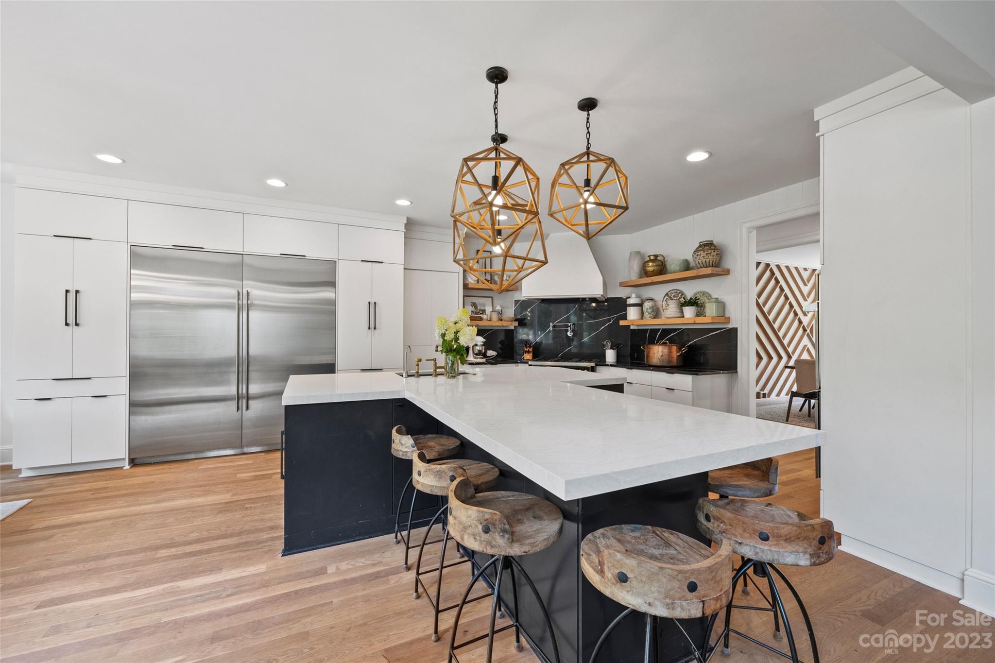 18930 Mary Ardrey Circle Cornelius, NC 28031 - Photo 13 of 48 a kitchen with a table and chairs in it