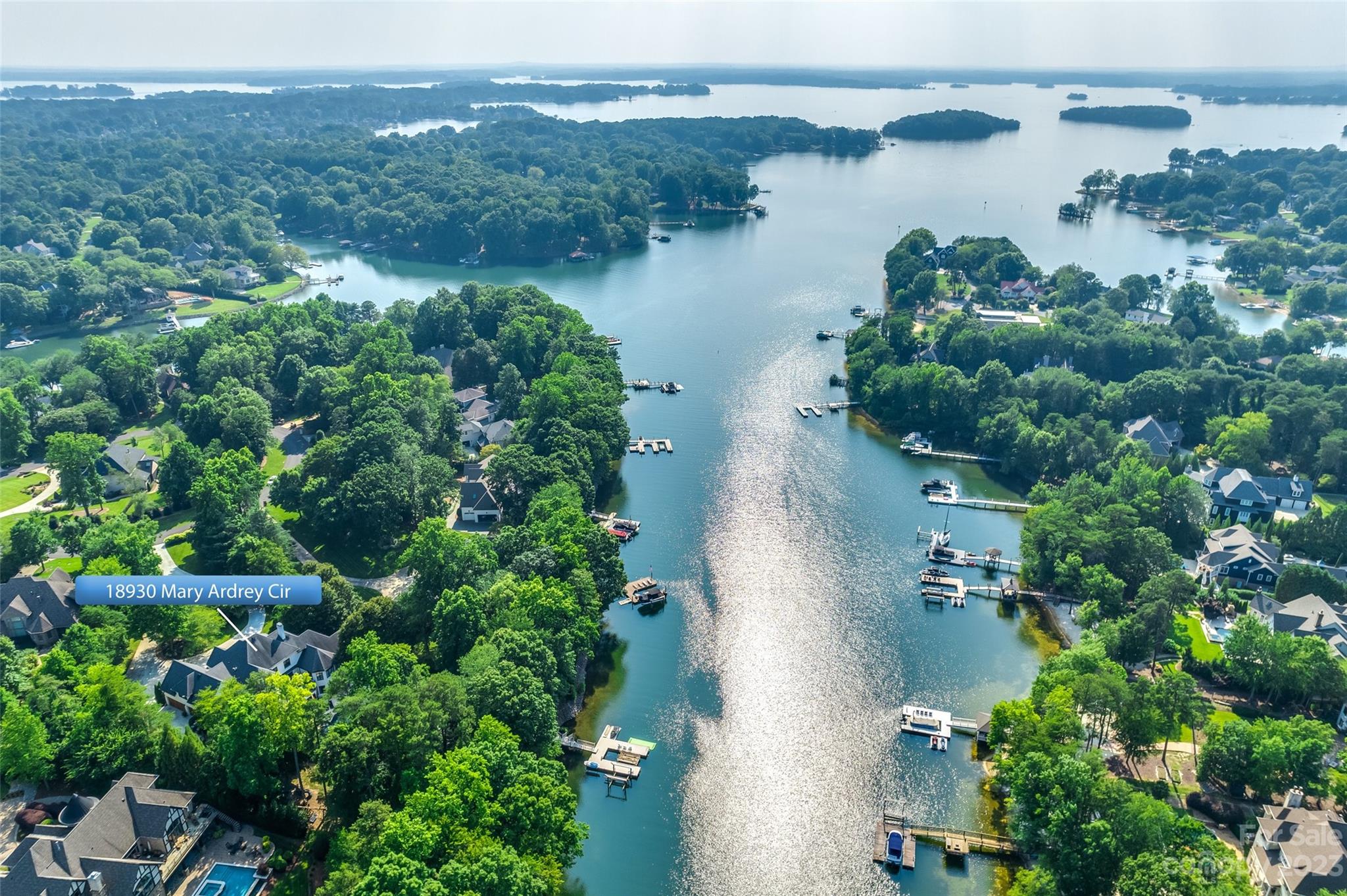 18930 Mary Ardrey Circle Cornelius, NC 28031 - Photo 2 of 48 an aerial view of lake residential house with outdoor space and trees all around