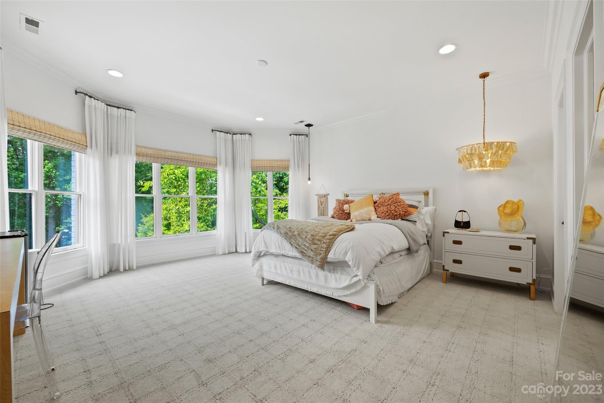 18930 Mary Ardrey Circle Cornelius, NC 28031 - Photo 27 of 48 a bed room with furniture and a window