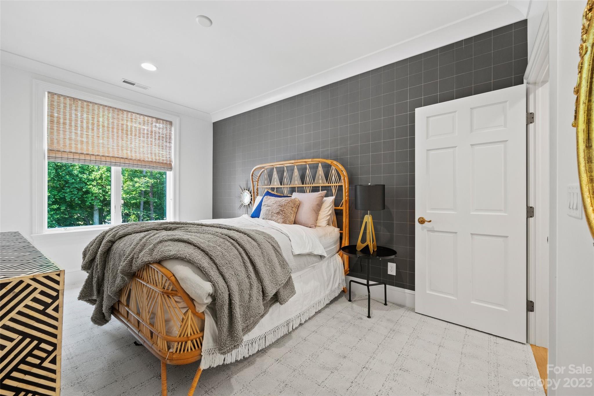 18930 Mary Ardrey Circle Cornelius, NC 28031 - Photo 29 of 48 a bedroom with a bed and window