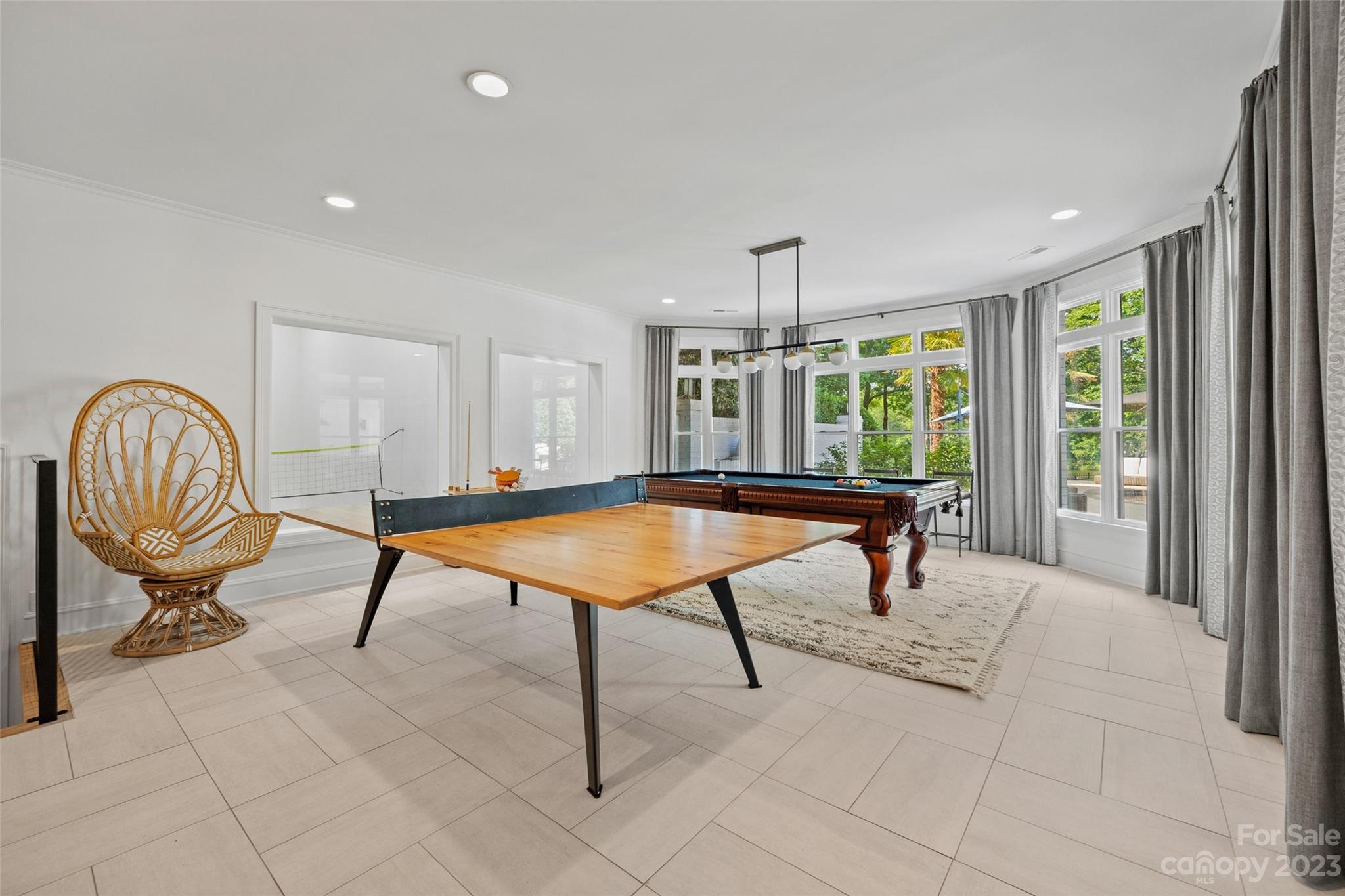 18930 Mary Ardrey Circle Cornelius, NC 28031 - Photo 35 of 48 a room with furniture pool table and windows
