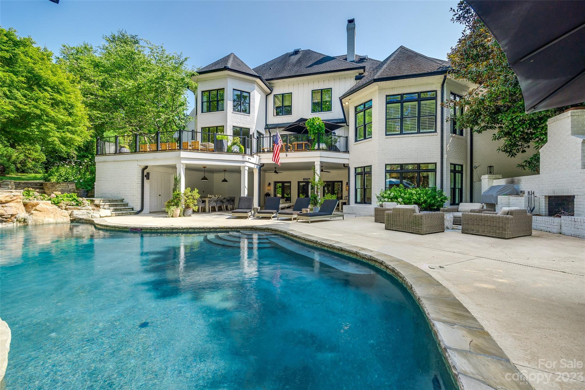 18930 Mary Ardrey Circle Cornelius, NC 28031 - Photo 43 of 48 a aerial view of a house with swimming pool next to a yard