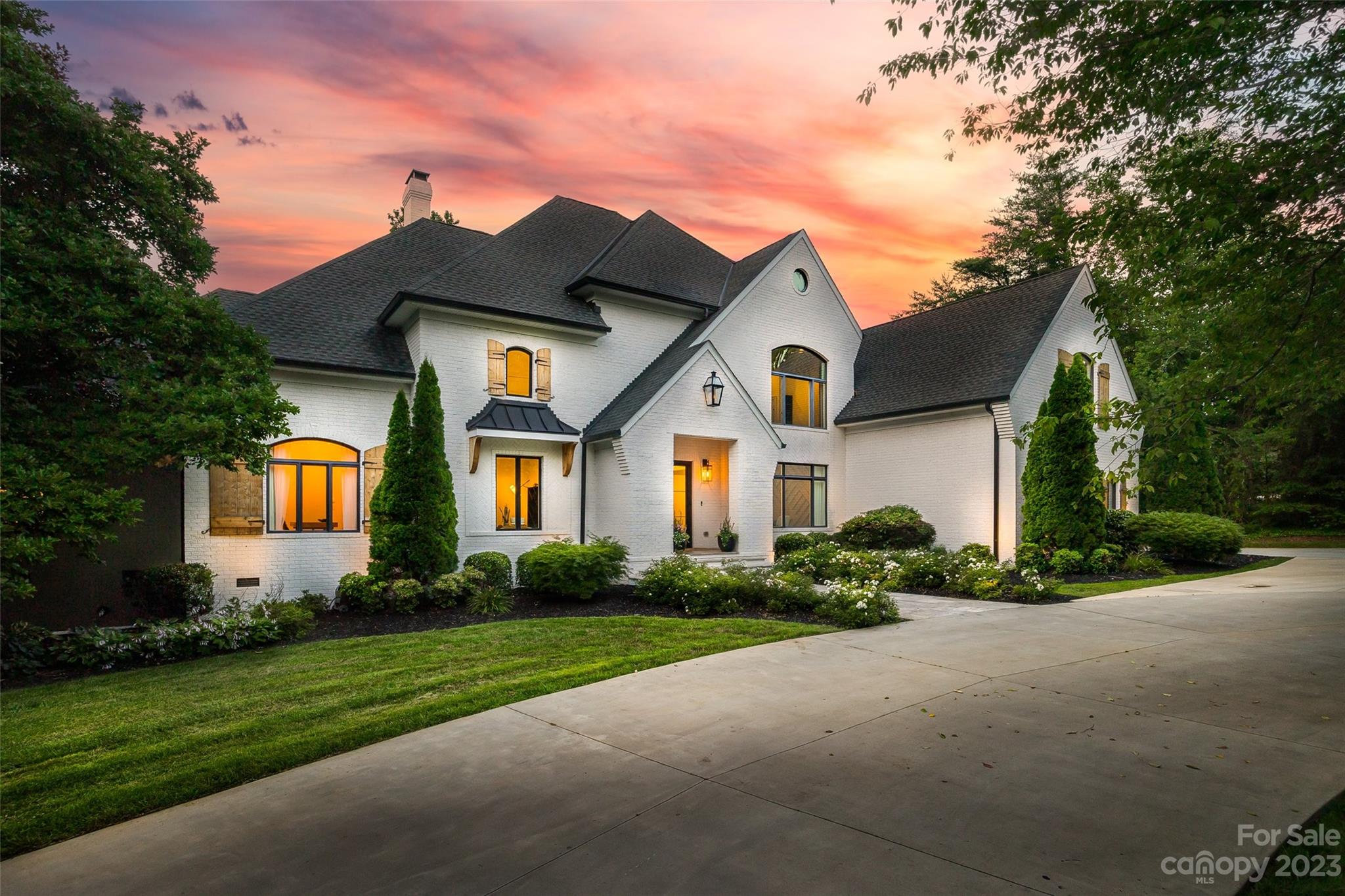 18930 Mary Ardrey Circle Cornelius, NC 28031 - Photo 47 of 48 a front view of a house with a yard