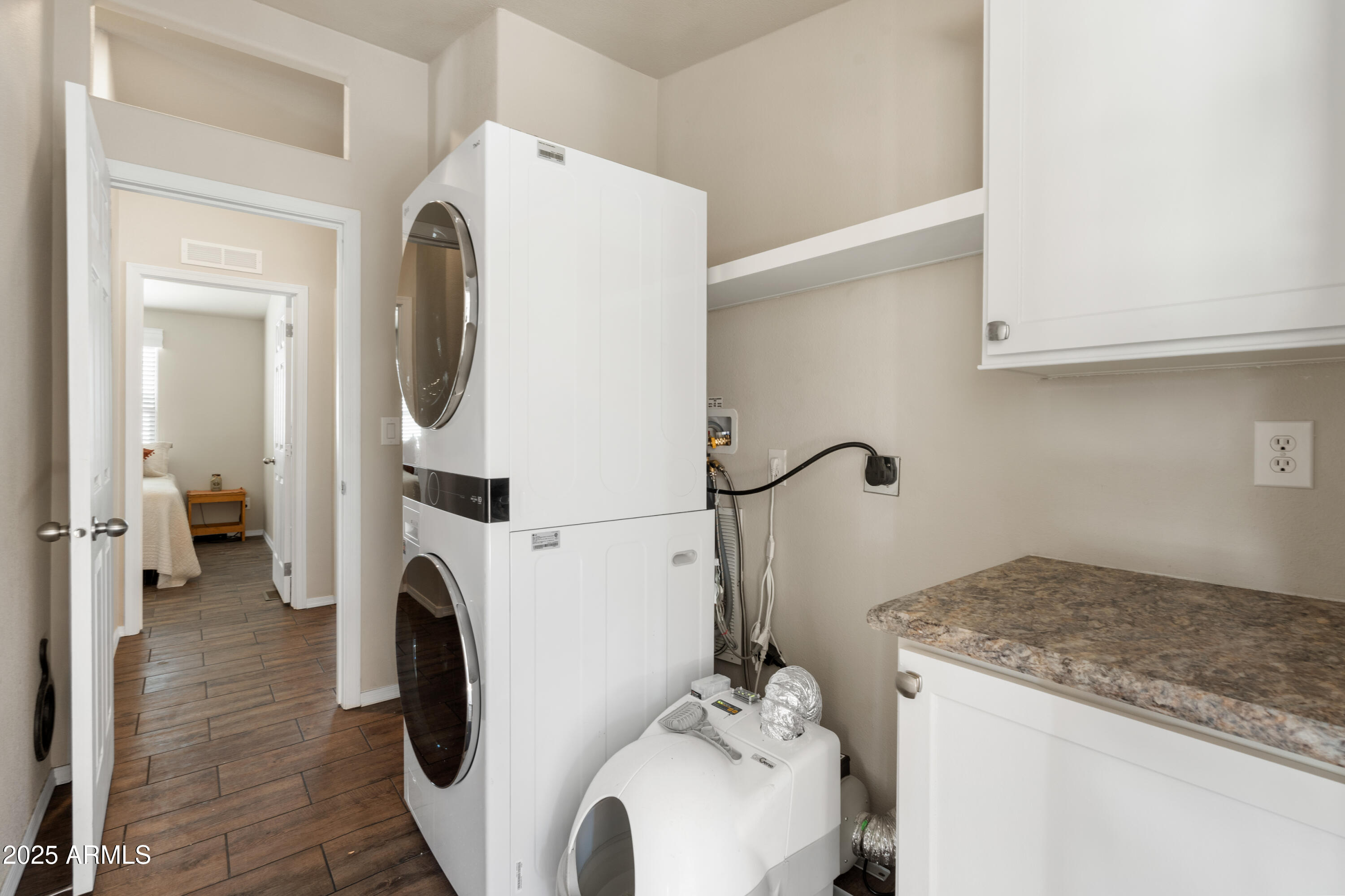 1174 Wheeler Road Camp Verde, AZ 86322 - Photo 15 of 23 a utility room with dryer and washer