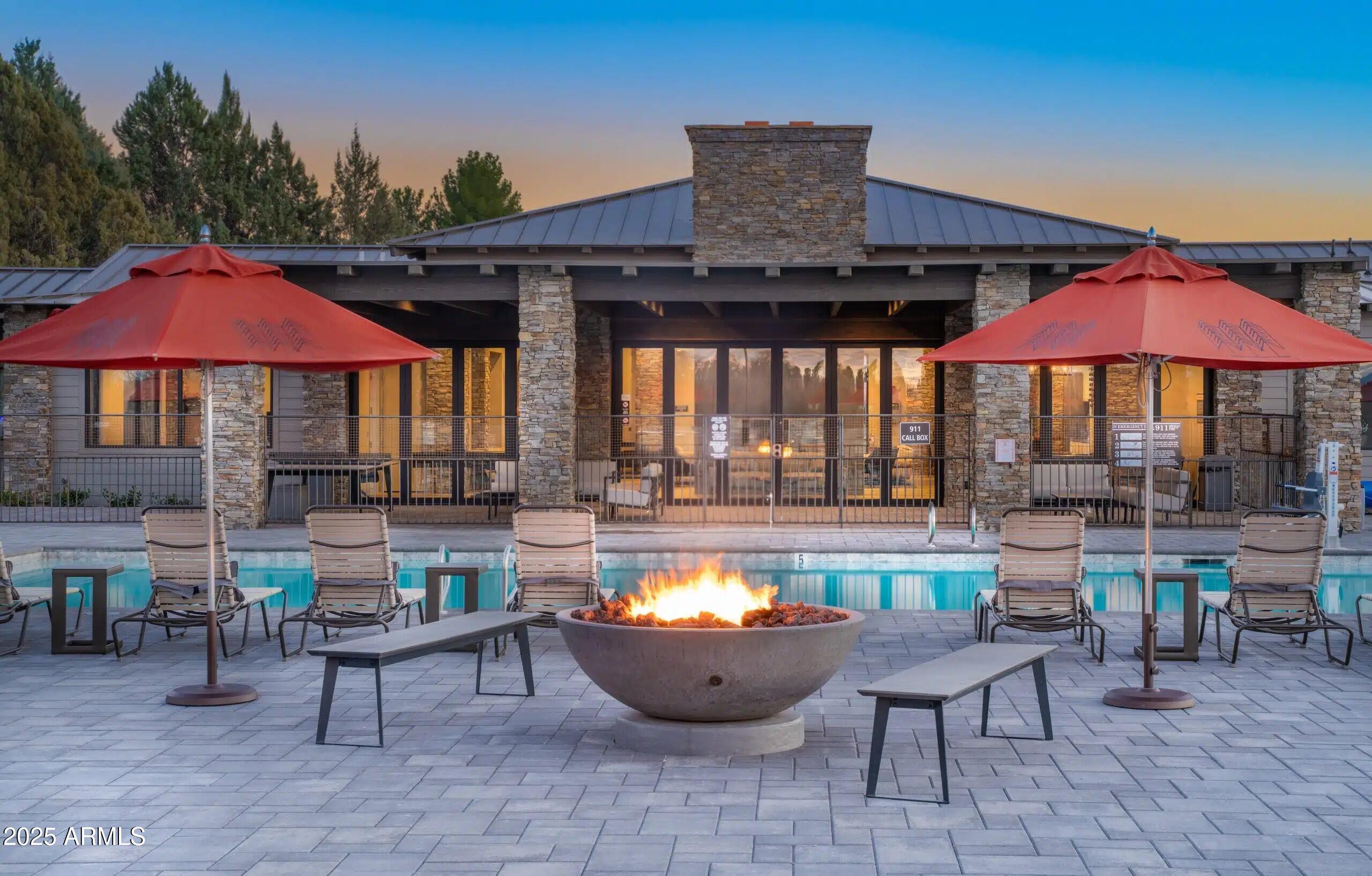 1174 Wheeler Road Camp Verde, AZ 86322 - Photo 10 of 23 a view of a patio with chairs and table under an umbrella