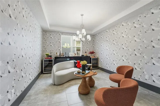 a spacious bathroom with a double vanity sink a mirror and a bathtub